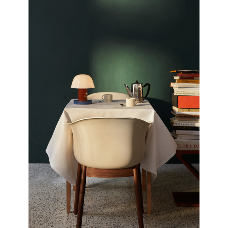 The Setago Portable Lamp from &Tradition in a dining room.