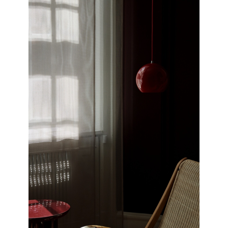 The Topan VP6 Pendant from &Tradition in a bedroom.