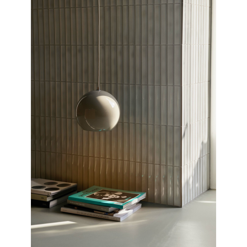 The Topan VP6 Pendant from &Tradition in a living room.