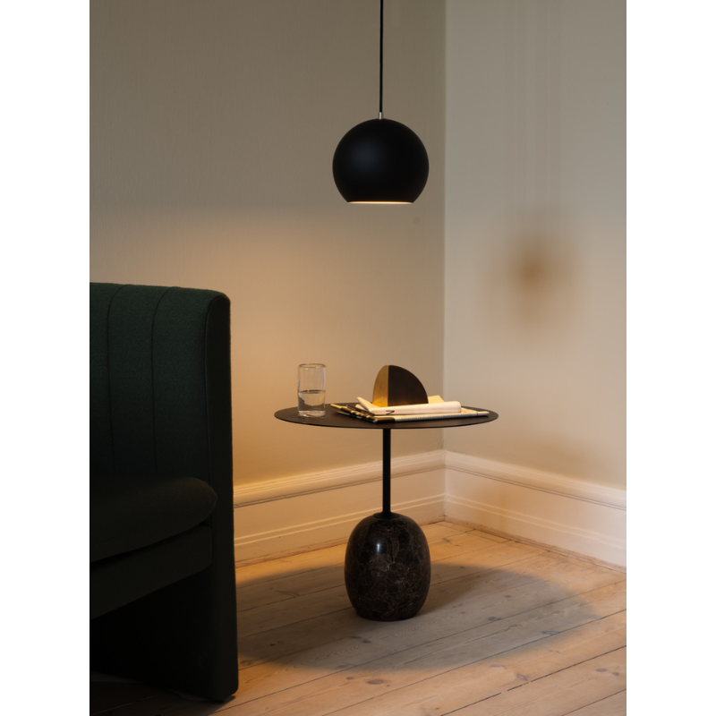 The Topan VP6 Pendant from &Tradition in an office.