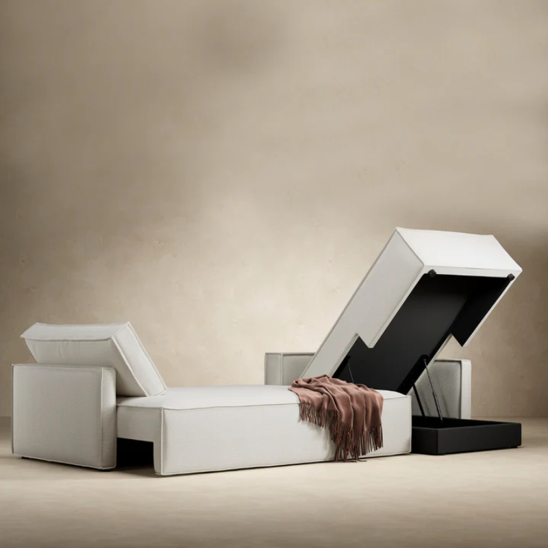 The Newilla sectional sleeper sofa with lounger converted in living room