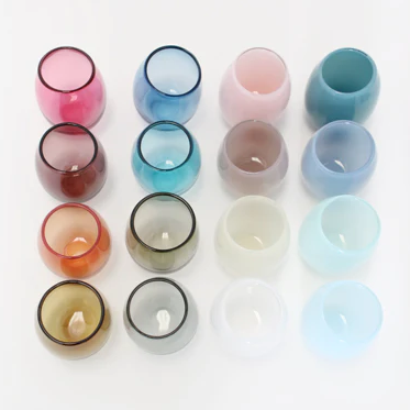 Drink is a collection of minimal glassware with a focus on color. Available in sets of four, in four palettes of either opaque or transparent glass colors. Drink are intentionally irregular, with a distinct off-center attitude that identifies them as skillfully handmade. Each is individually handblown, no two are exactly alike. Sold as a set of 4.