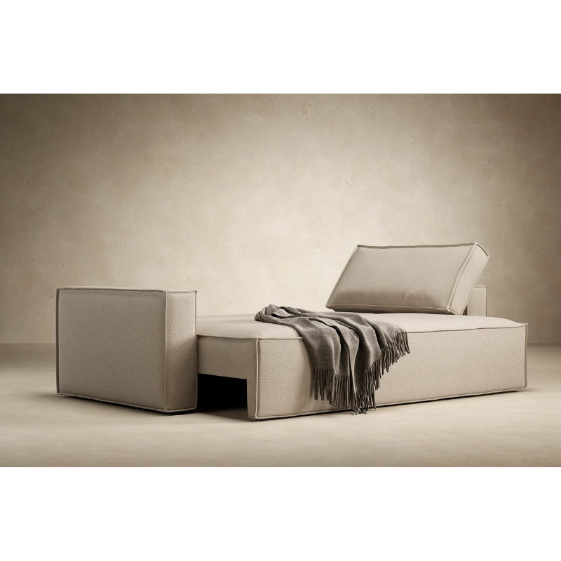 The versatile Newilla Sofa Bed can be used in both living rooms and secondary rooms, with a lift-out seat that effortlessly converts the sofa into a Full XL bed.