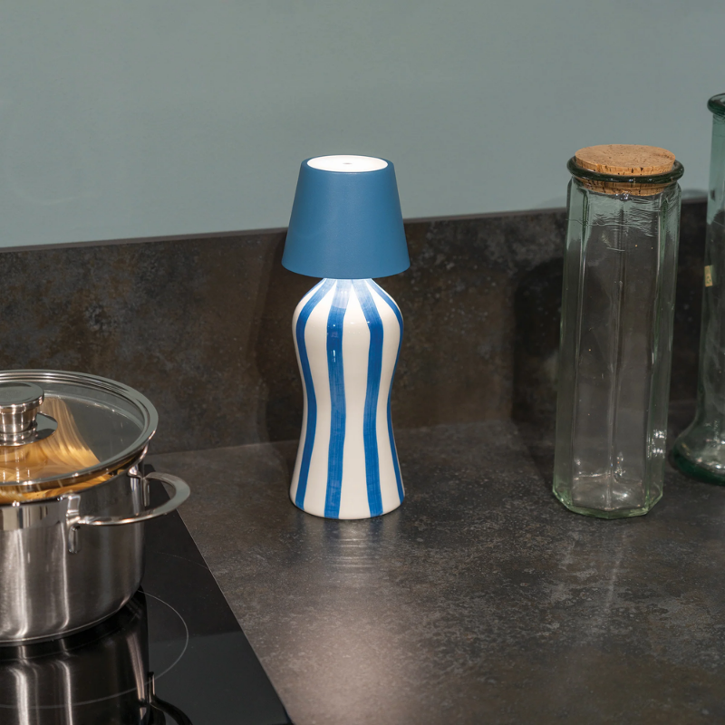 The avio blue Poldina Pro Stopper from Zafferano in a kitchen.