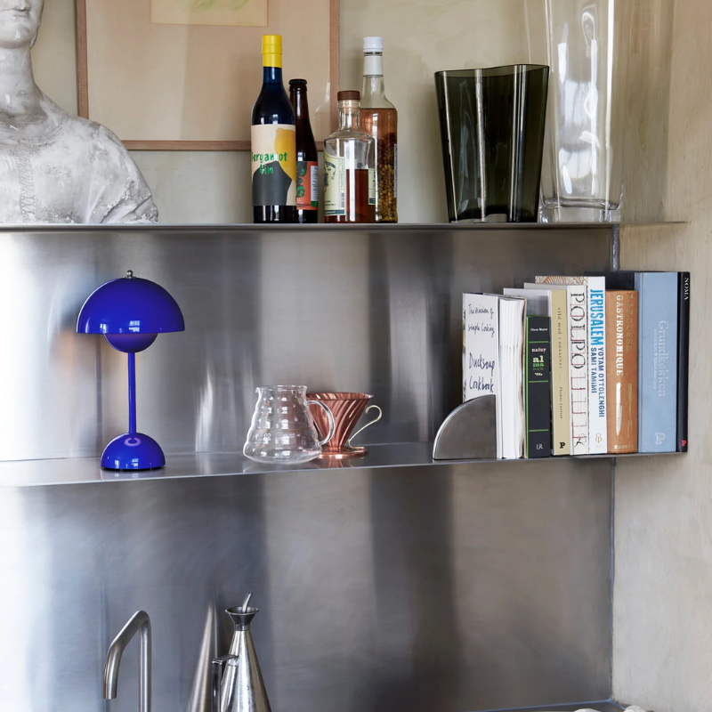 &Tradition VP9 Flowerpot Portable Table Lamp in cobalt blue on stainless steel shelf