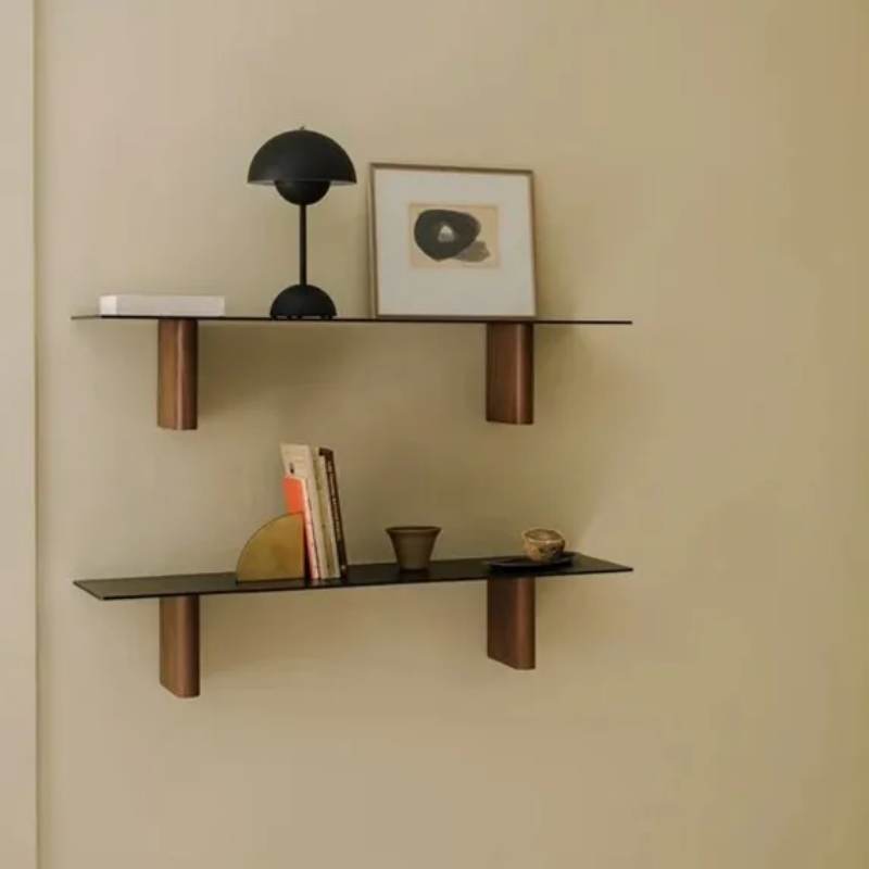 &Tradition VP9 Flowerpot Portable Table Lamp in matte black on wall shelf.