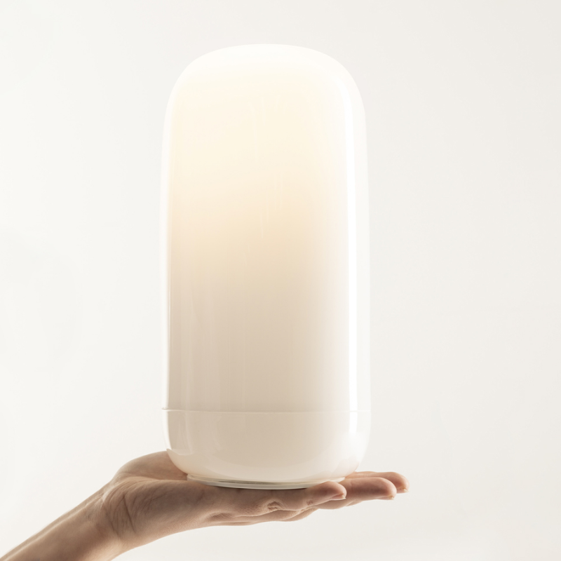 The Gople Portable Lamp from Artemide in a lifestyle.