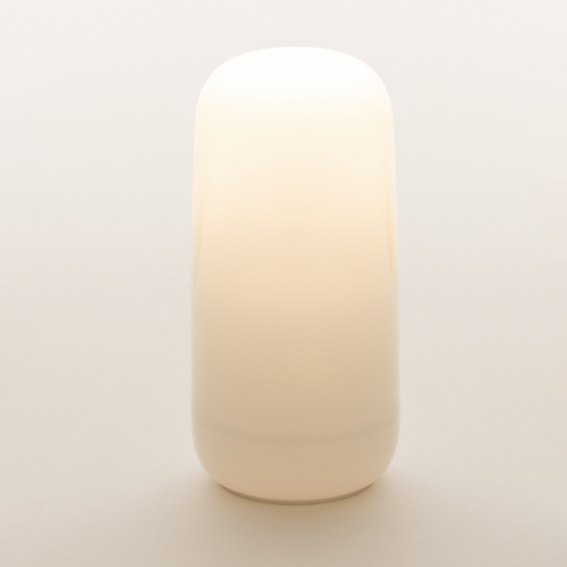 The Gople Portable Lamp from Artemide in a studio.