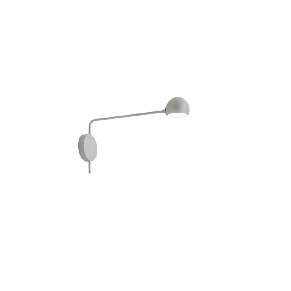 The white Ixa Reading Wall Sconce from Artemide.