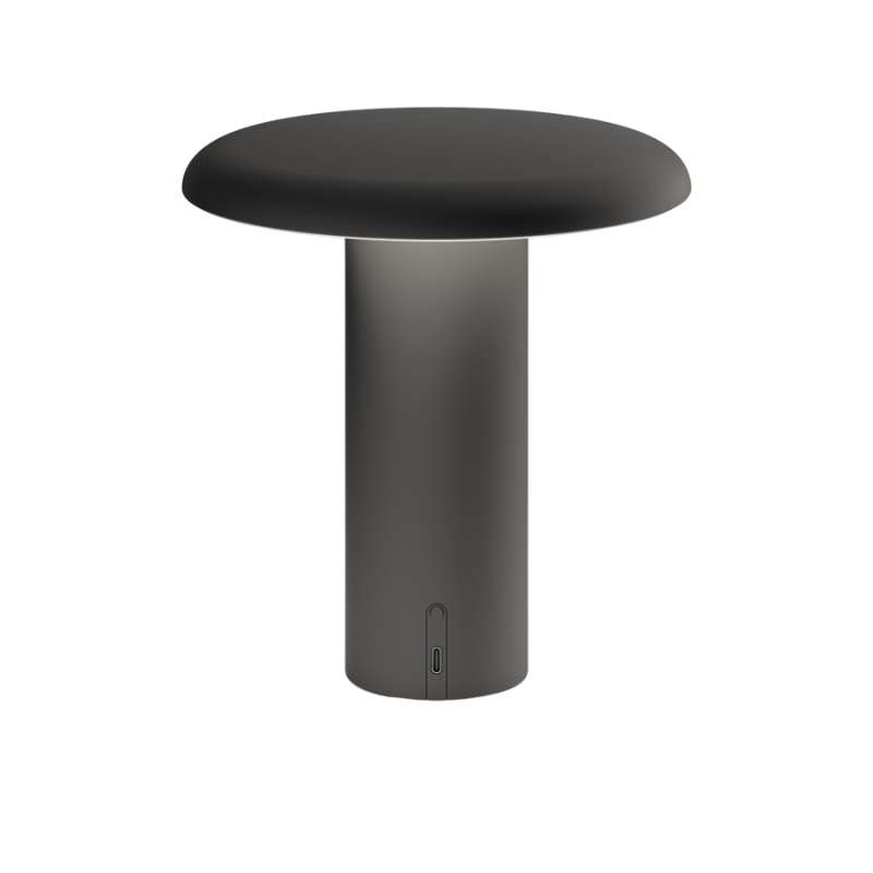 The Takku Portable Lamp from Artemide in black.