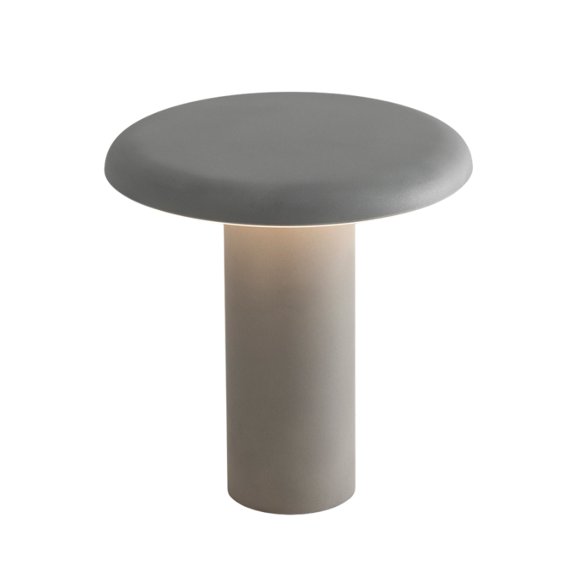 The Takku Portable Lamp from Artemide in grey.