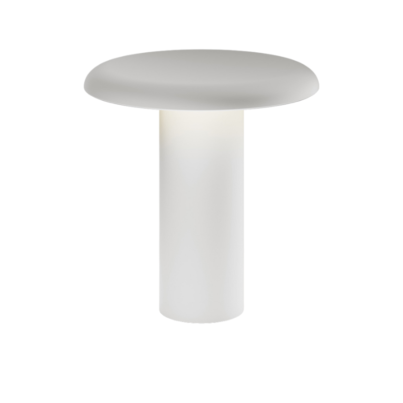 The Takku Portable Lamp from Artemide in white.