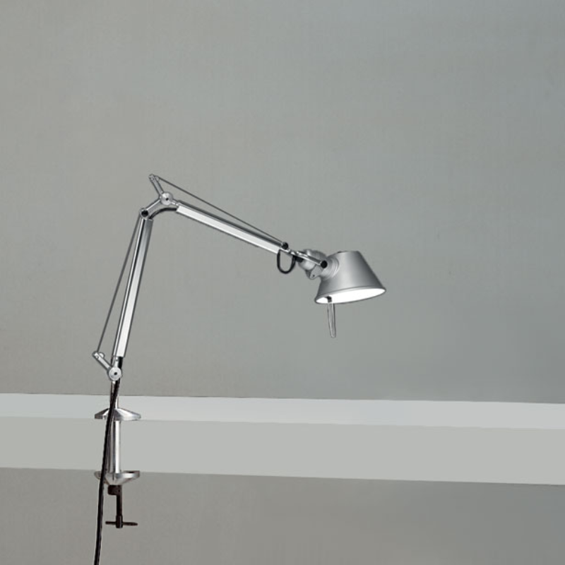The Tolomeo Micro Table Lamp from Artemide in aluminum with the table clamp and integrated LED.