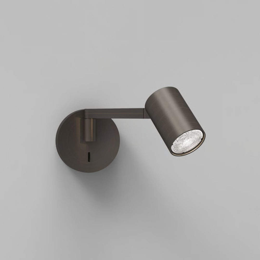 The bronze Ascoli Swing Reading Light from Astro Lighting in a studio.
