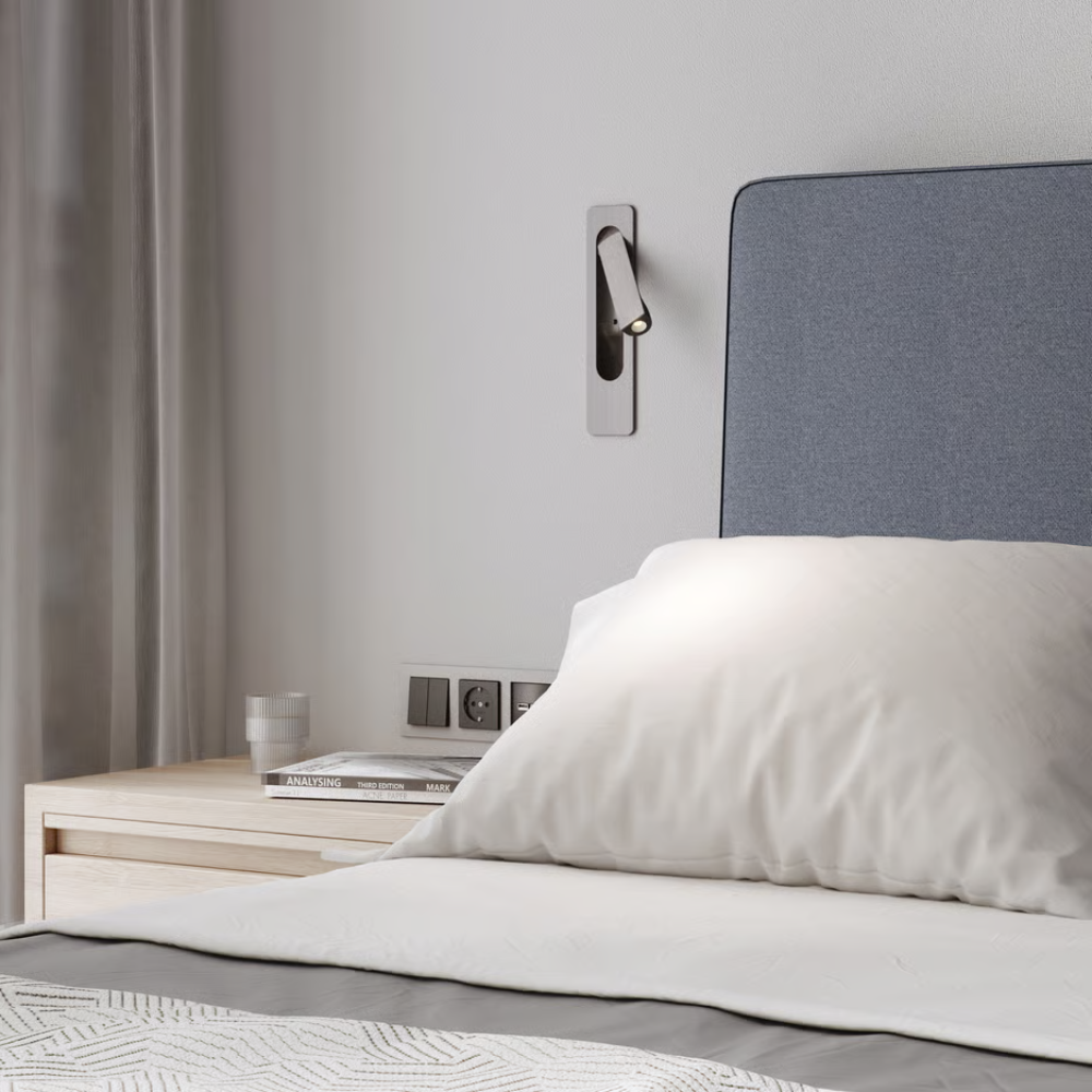 The matte nickel Keta Reading Light from Astro Lighting used as bedside lighting.