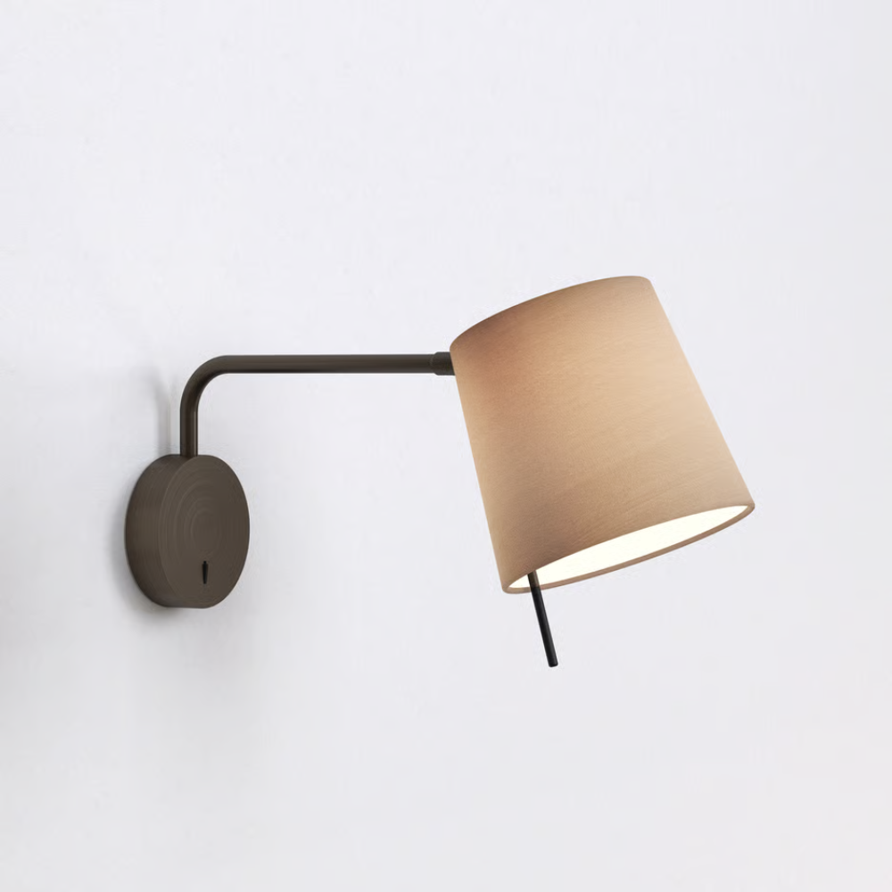 The bronze Mitsu Swing Arm Wall Sconce from Astro Lighting with the oyster shade in a home office.