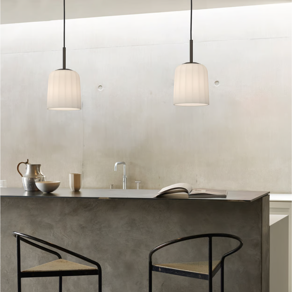 The small Veo Pendant from Astro Lighting in a dining and kitchen area.