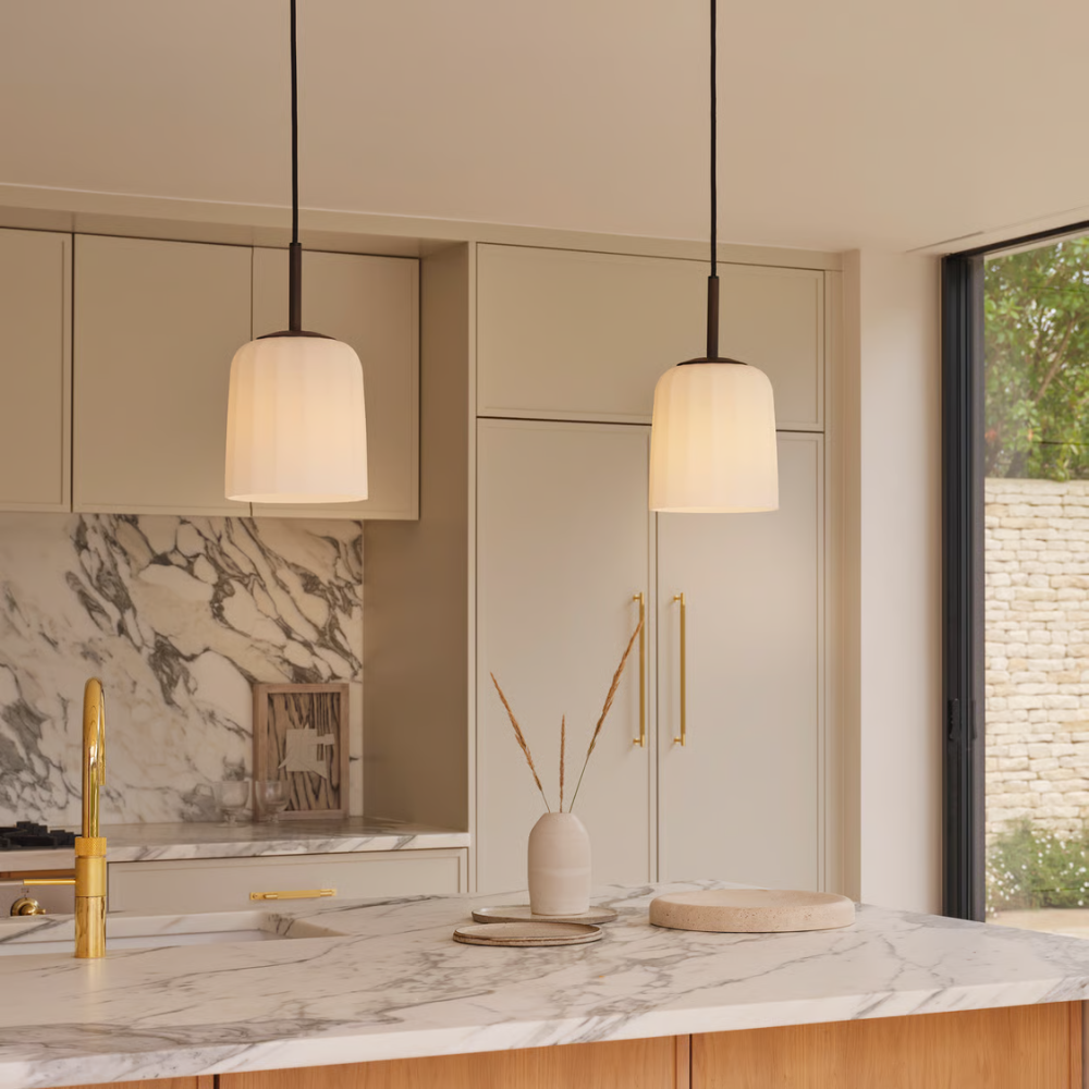 The small Veo Pendant from Astro Lighting above a kitchen island.