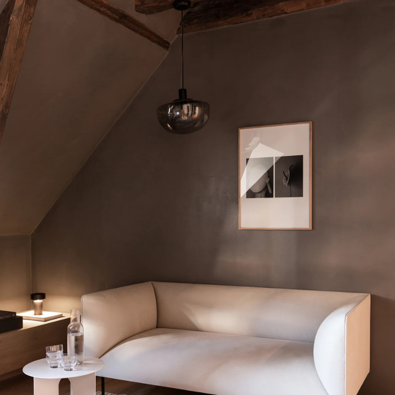 The Bank Pendant from Audo Copenhagen in a lounge.