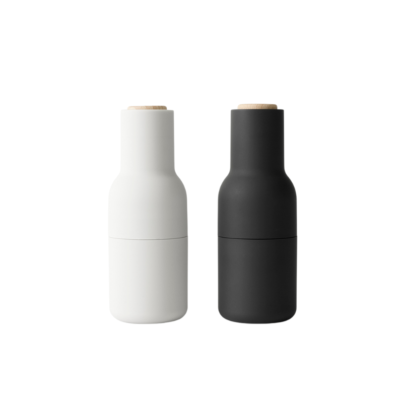 The Bottle Grinder from Audo Copenhagen in carbon and ash with beech lid.