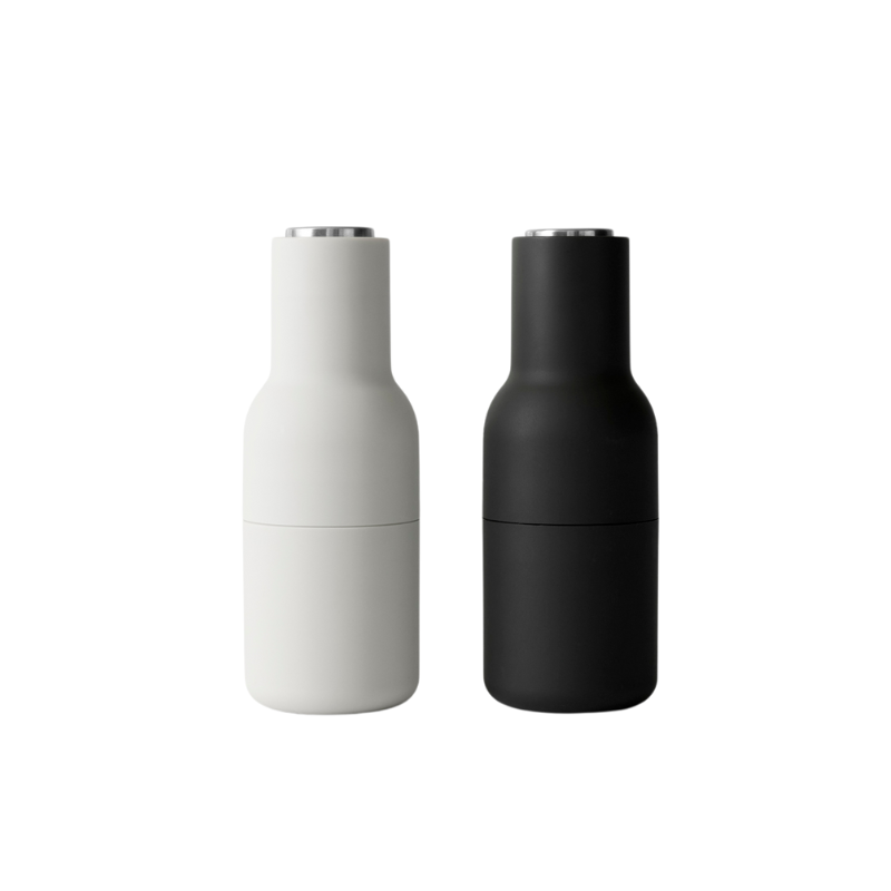 The Bottle Grinder from Audo Copenhagen in carbon and ash with steel lid.