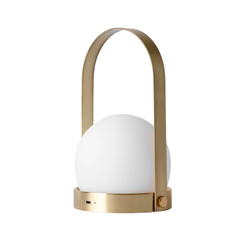 The Carrie Portable LED Lamp from Audo Copenhagen in brushed brass.