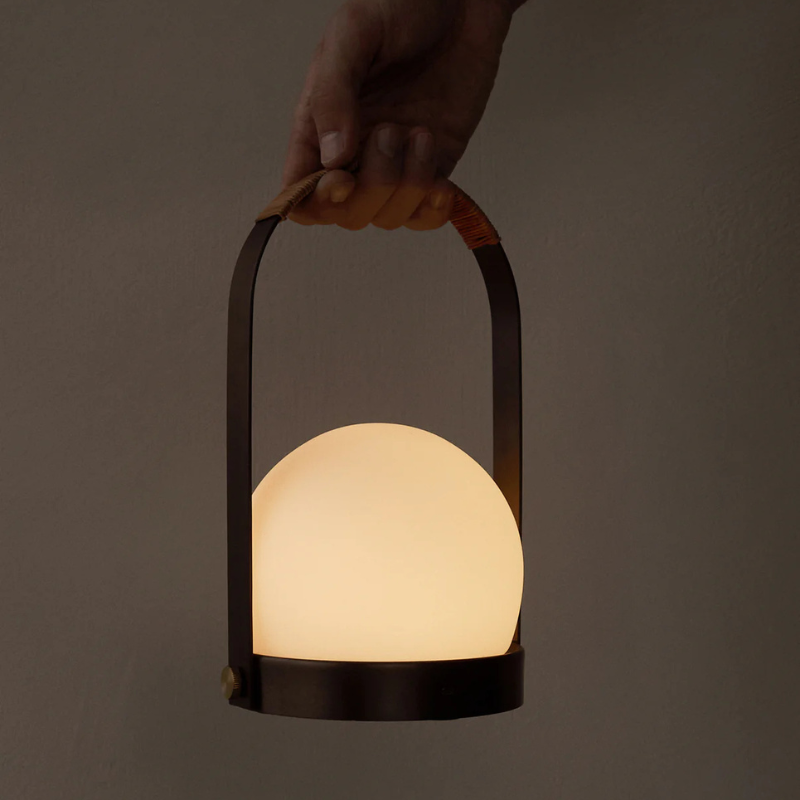 The Carrie Portable LED Lamp from Audo Copenhagen in a lifestyle. all-groups