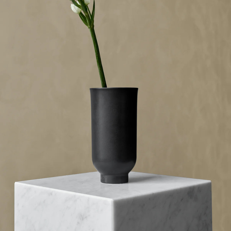 The Cubic Marble Plinth from Audo Copenhagen with decor.