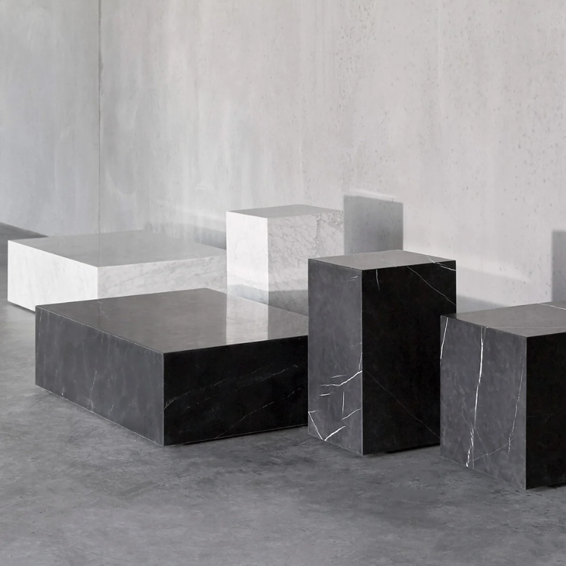 The Cubic Marble Plinth from Audo Copenhagen in a display.