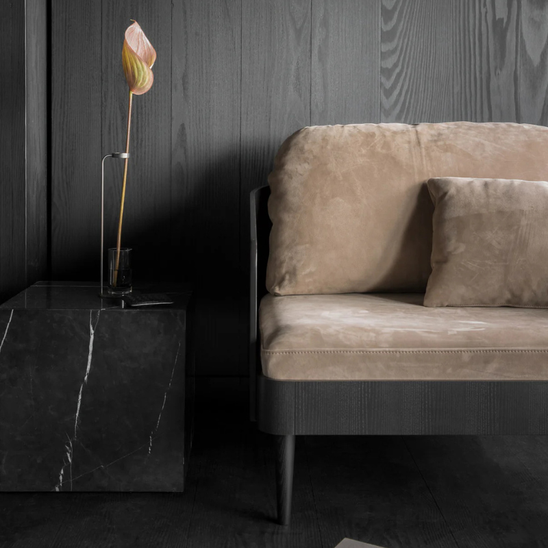 The Cubic Marble Plinth from Audo Copenhagen in a living space.