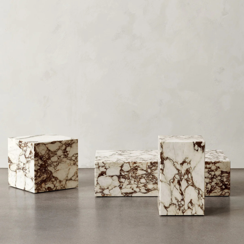 The Cubic Marble Plinth from Audo Copenhagen in a studio.