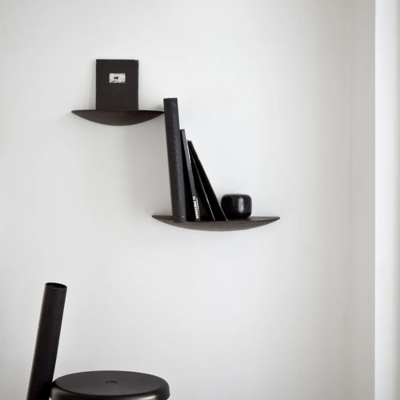 The Gridy Fungi Shelf from Audo Copenhagen in dark oak in the bedroom.