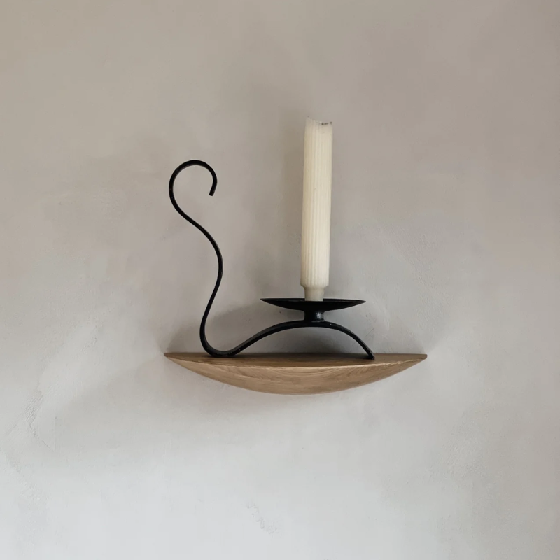 The Gridy Fungi Shelf from Audo Copenhagen in oak in a medium size on the wall of a dining room.