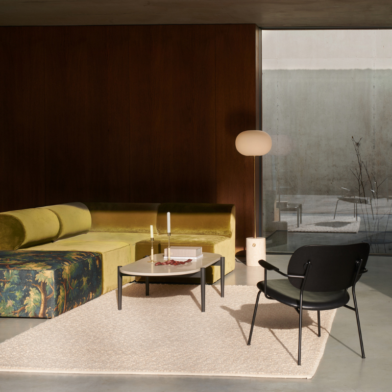 The JWDA Floor Lamp from Audo Copenhagen in a living room.