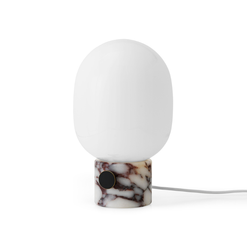 The JWDA Table Lamp from Audo Copenhagen in calacatta viola marble angled.