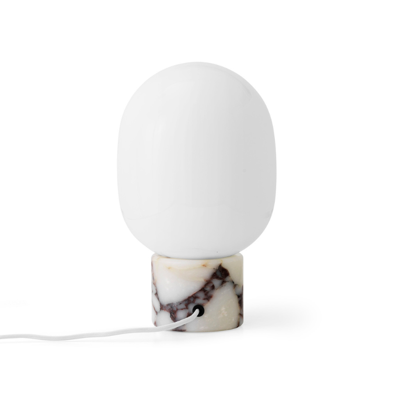 The JWDA Table Lamp from Audo Copenhagen in calacatta viola marble from the rear.