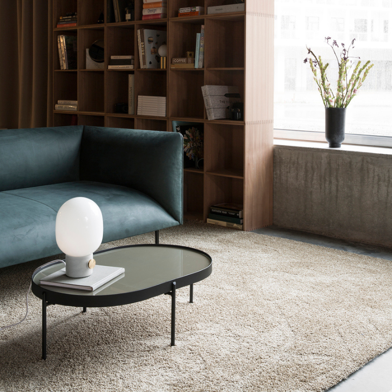 The JWDA Table Lamp from Audo Copenhagen in a living room.