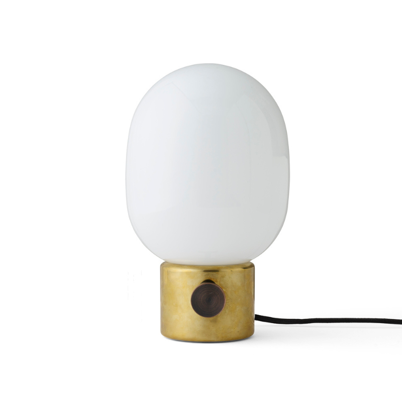 The JWDA Table Lamp from Audo Copenhagen in polished brass.