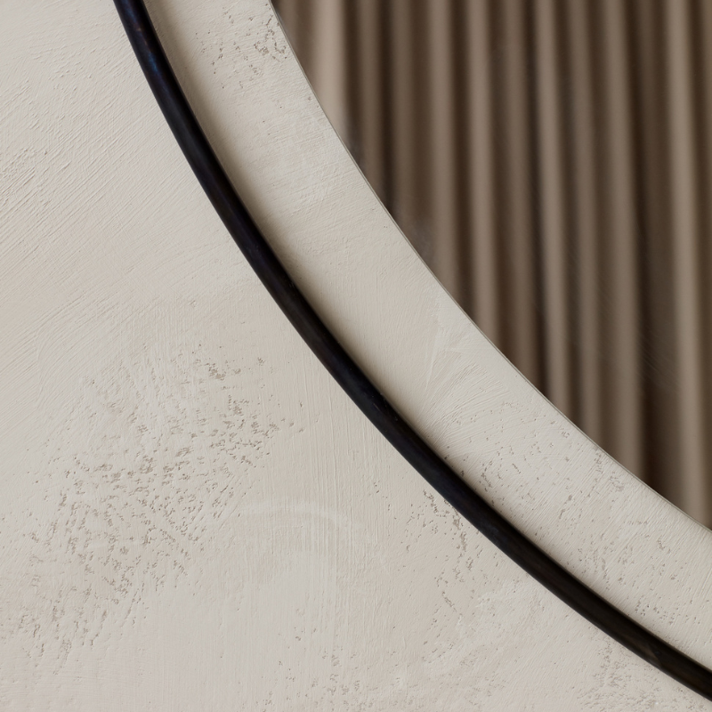The Round Nimbus Mirror from Audo Copenhagen in detail.