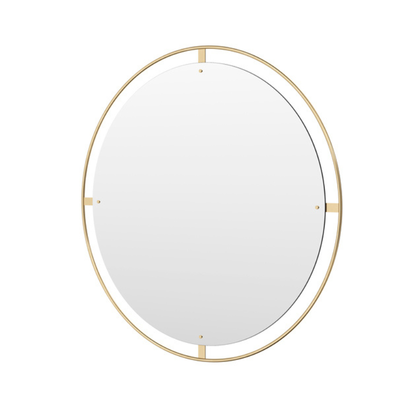 The Round Nimbus Mirror from Audo Copenhagen in polished brass, 43 inch size angled.