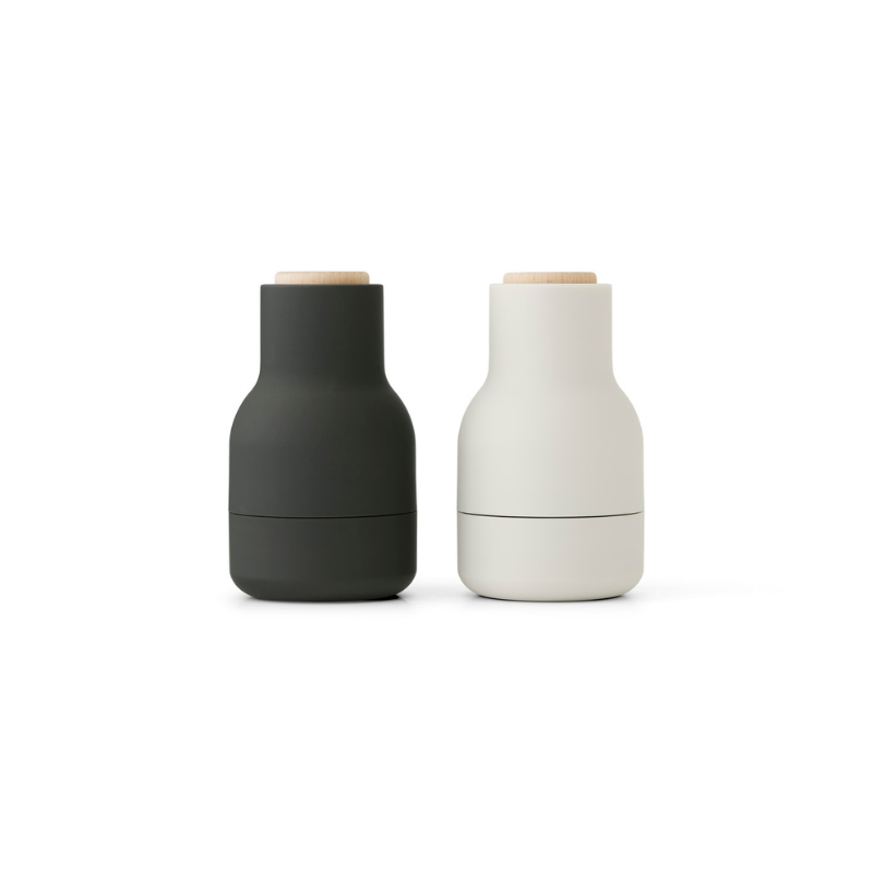 The Small Bottle Grinder from Audo Copenhagen in carbon and ash with beech lid.