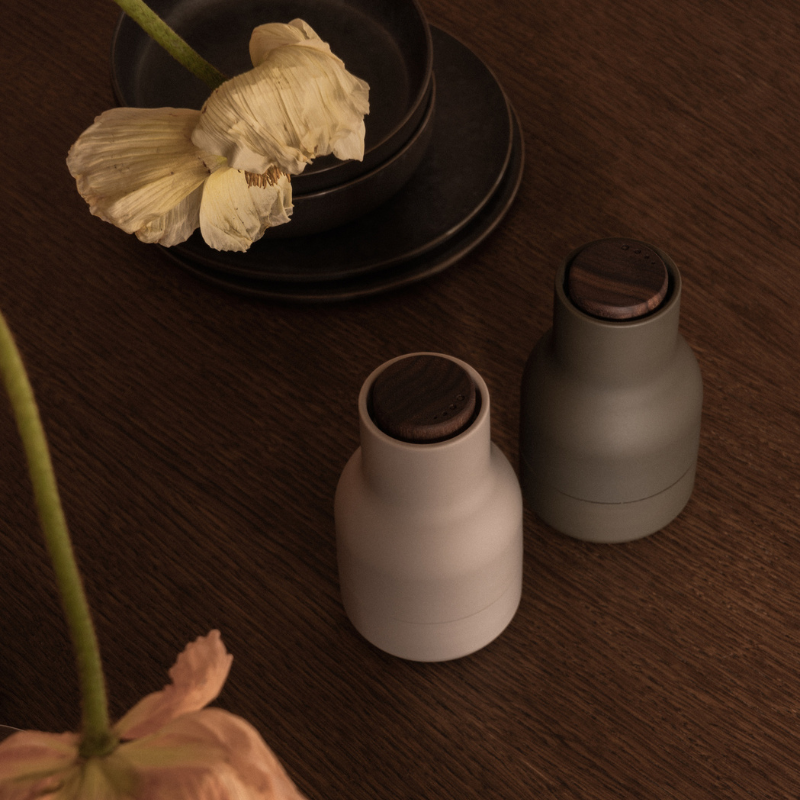 The Small Bottle Grinder from Audo Copenhagen in a kitchen.