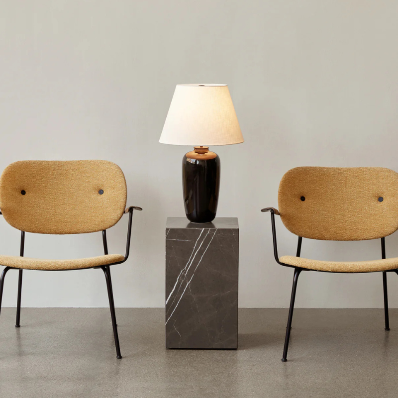 The Tall Marble Plinth from Audo Copenhagen in a business.