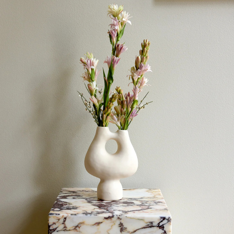 The Tall Marble Plinth from Audo Copenhagen used as a display stand.