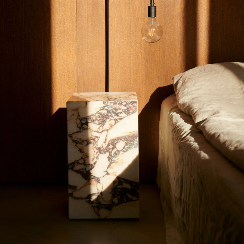 The Tall Marble Plinth from Audo Copenhagen in a guest room.