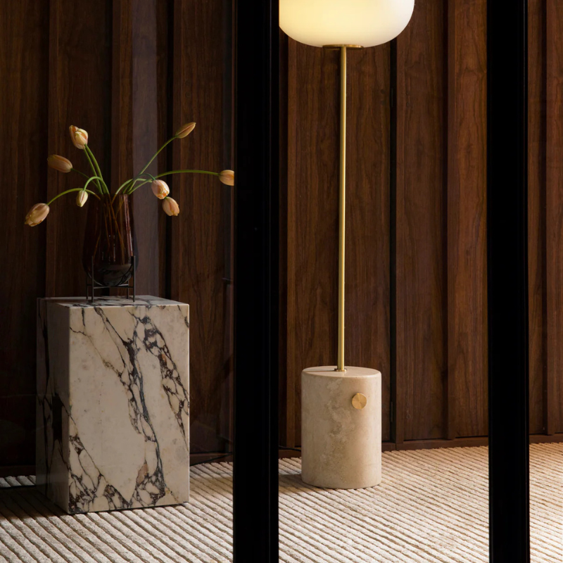 The Tall Marble Plinth from Audo Copenhagen in a home.