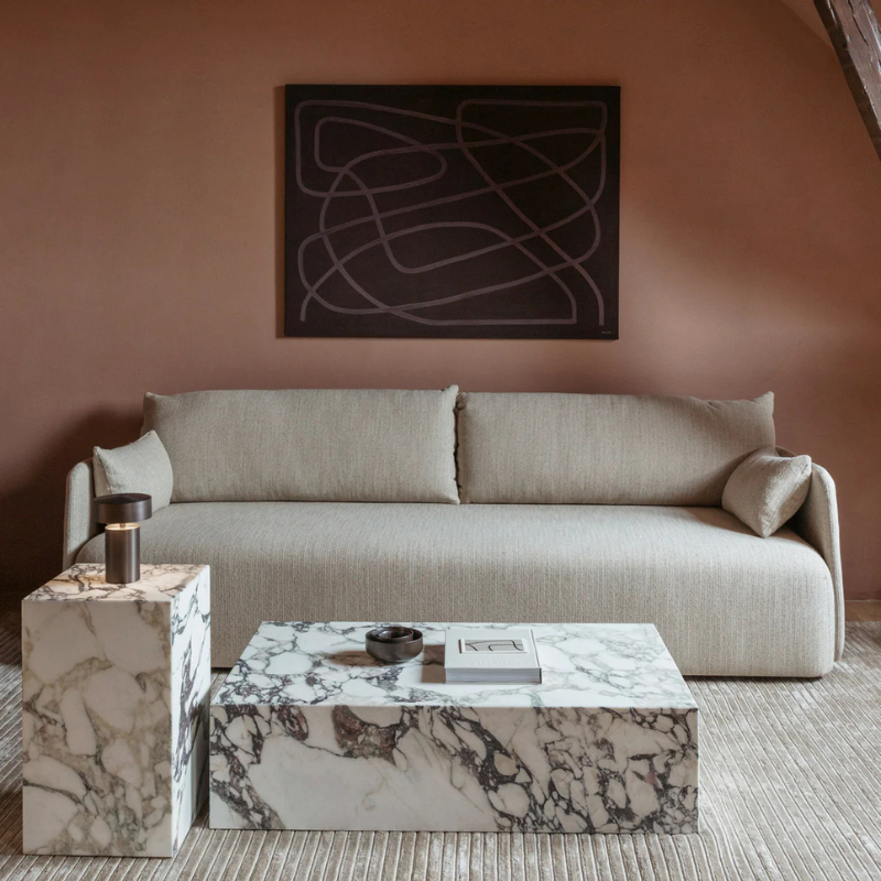 The Tall Marble Plinth from Audo Copenhagen in a living space.