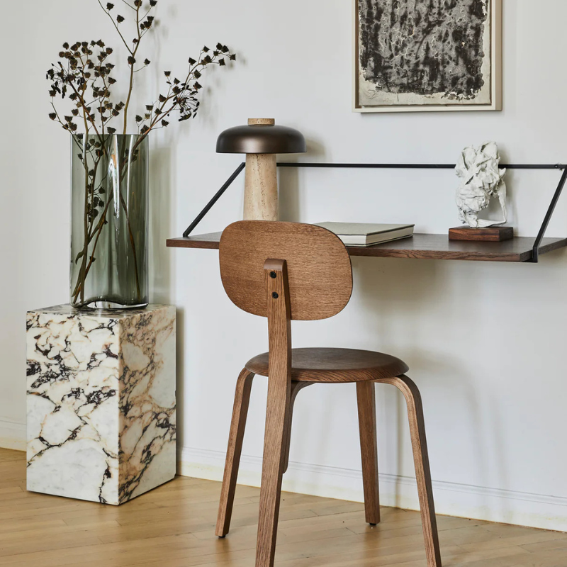 The Tall Marble Plinth from Audo Copenhagen in an office.