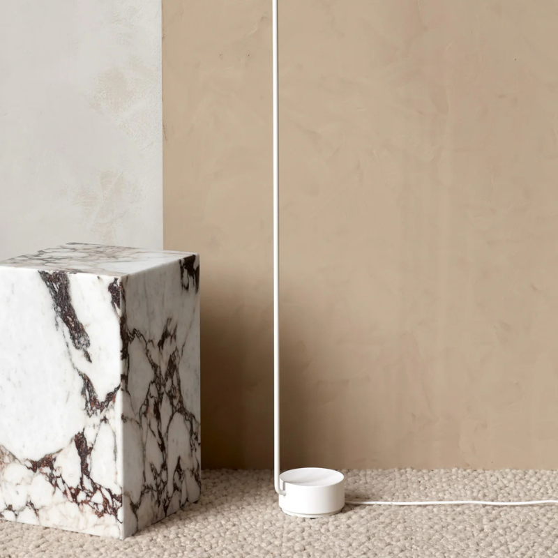 The Tall Marble Plinth from Audo Copenhagen used as a sculptural accent.