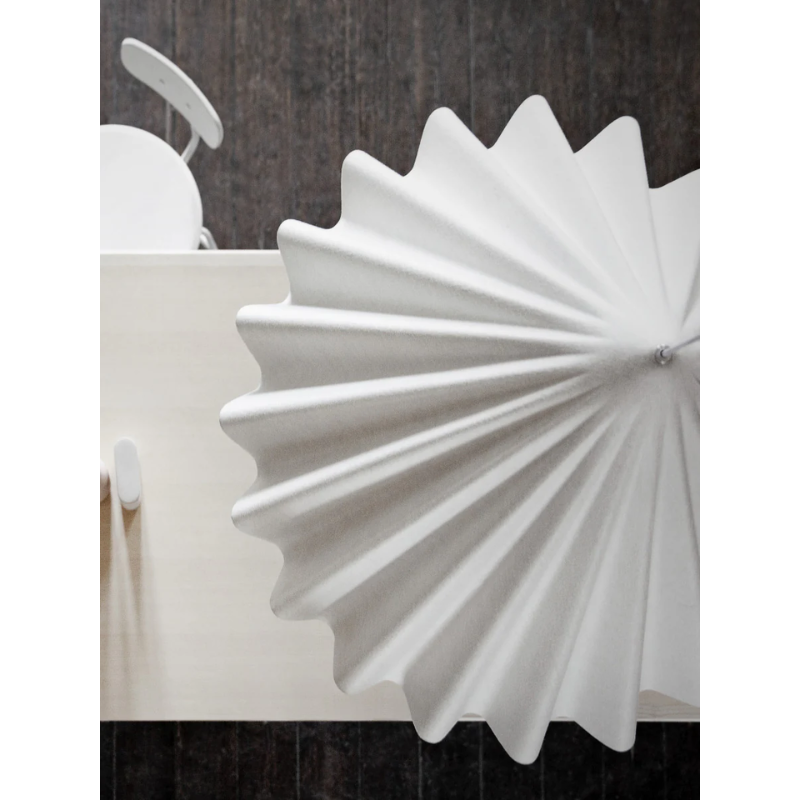 Crimped shade pendant light. The Dancing Pendant by Audo CPH detail view from above of white felt shade.